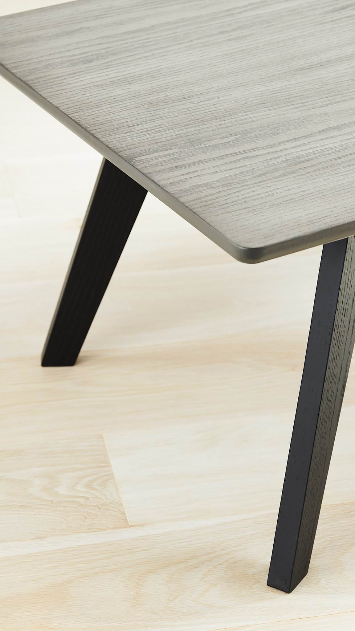 Rabbet Home 1003-20 Cocktail Table Grey Oak Top Ebonized Oak Legs Closeup