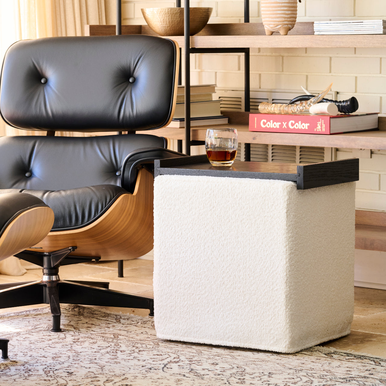 a square image of the Rabbet 1008-60 ottoman next to a popular lounge chair